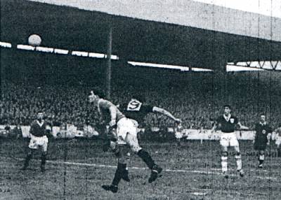 Easson challenges the Rangers defence at Ibrox